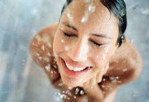 Picture of a woman smiling in the shower