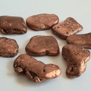Image of eight pieces of copper