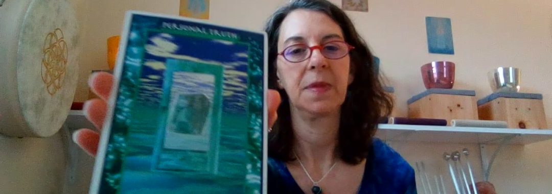 Photo of Saralee holding the Crystal Tarot card for Jan 2021 - Amazonite