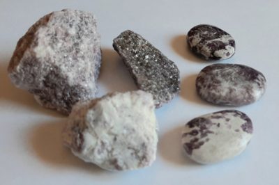 Image of raw Lepidolite and palmstones