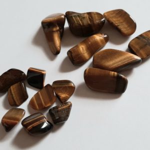 Image of both small and medium sized Tigers Eye crystals