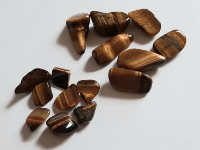 Image of both small and medium sized Tigers Eye crystals